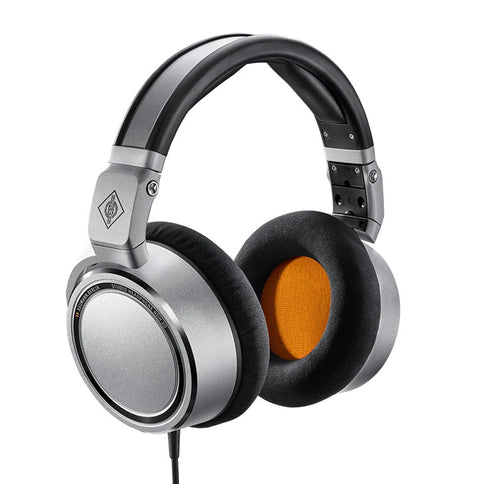 Neumann Closed-back studio headphone, silver with black and orange trim. Includes (1) NDH 20, (1) straight cable, (1) coiled cable, (1) 6.3mm (1/4") adapter, and (1) cloth pouch